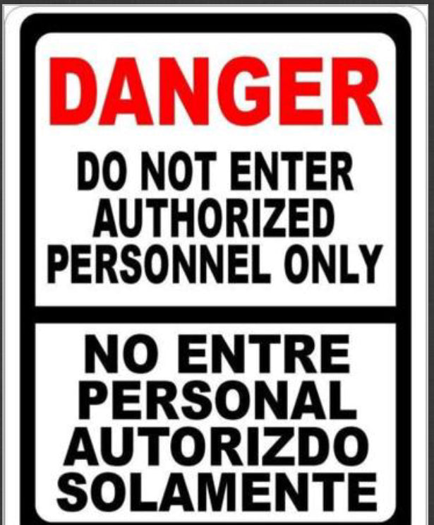 Bilingual Sign, Authorized Personnel Only